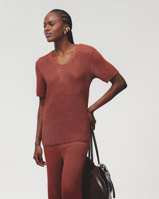 Blusa feminina alongada em tricot